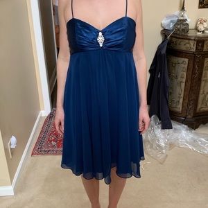 Blue David’s Bridal flare spaghetti strap dress